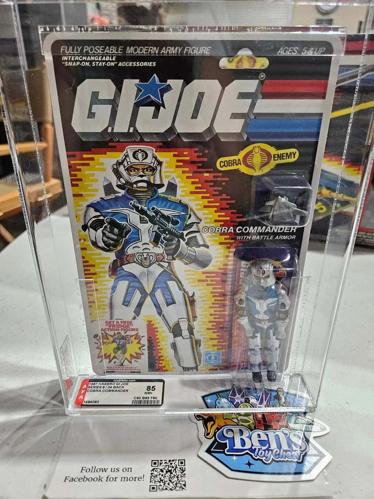 A carded G.I. Joe figure sealed inside a graded acrylic case