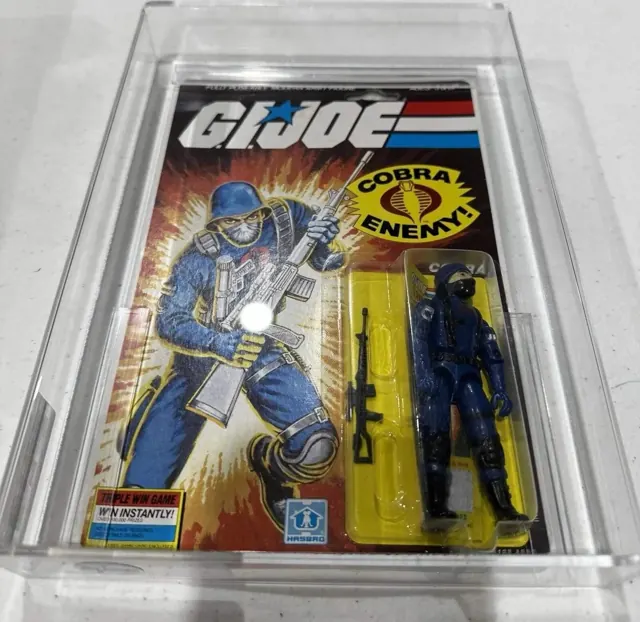 A 1985 Hasbro G.I. Joe Cobra figure sealed in an AFA acrylic case
