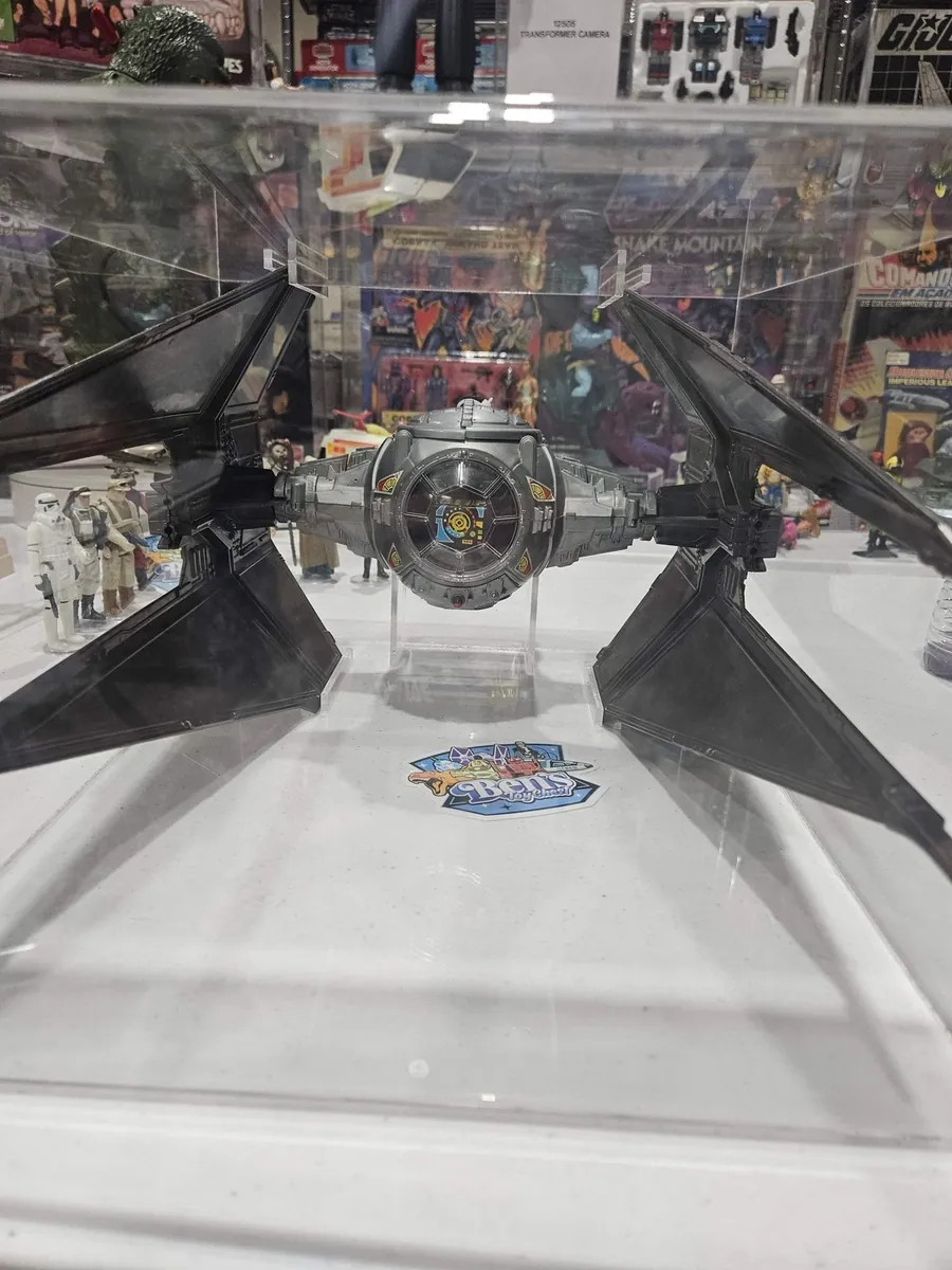 Star Wars TIE Interceptor on display in a graded case